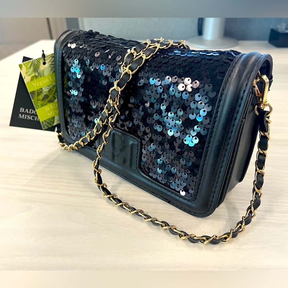 Badgley Mischka purse. NWT. Crossbody, sequined. Black with gold chained strap.